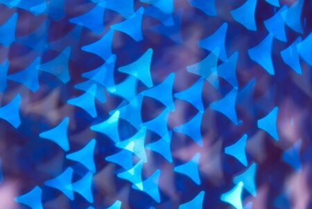 defocused abstract background of color night holiday lights の写真素材