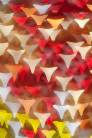 defocused abstract background of color night holiday lights 