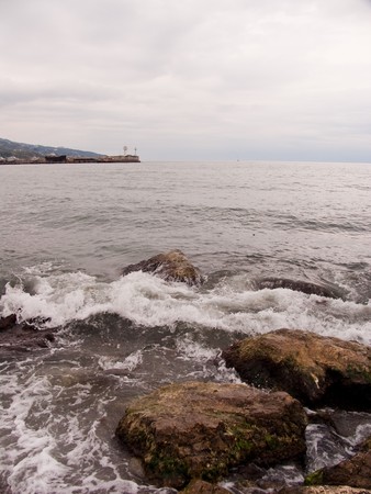 Coast of Black sea with a running waveの写真素材