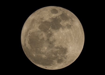 Full moon closeup showing the details of the lunar surfaceの写真素材