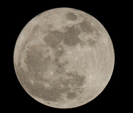 Full moon closeup showing the details of the lunar surfaceの写真素材