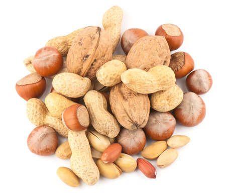Composition from nuts on the white isolated backgroundの写真素材