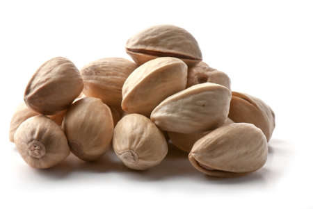 Composition from nuts on the white isolated backgroundの写真素材