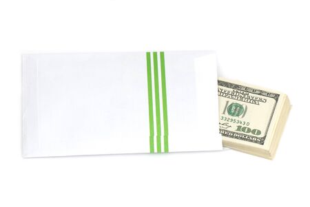 stack of money on white isolated background.  Studio photo.の写真素材