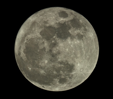 Full moon closeup showing the details of the lunar surfaceの写真素材