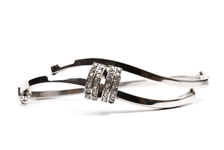 Expensive beautiful bracelet on the white isolated background 