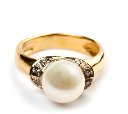 beautiful ring with a precious stone on a white background isolatedの写真素材
