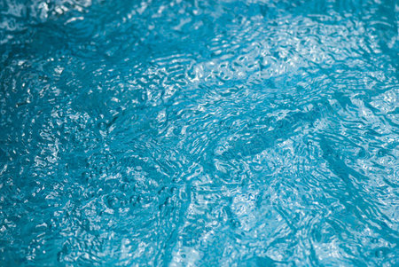 Beautiful splashes of fresh water on a color background
