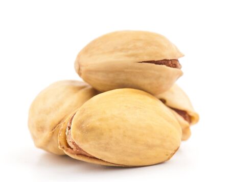 Composition from nuts on the white isolated backgroundの写真素材