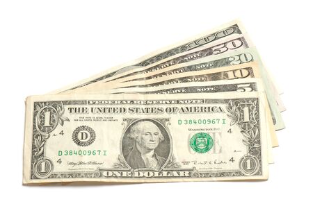 stack of money on white isolated background.  Studio photo.の写真素材