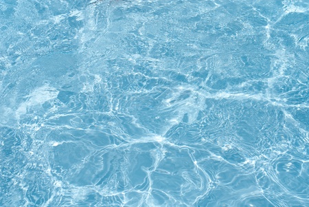 Beautiful splashes of fresh water on a color backgroundの写真素材