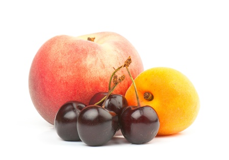 composition of the ripe mix of  fruit on a white background. studio photographyの写真素材