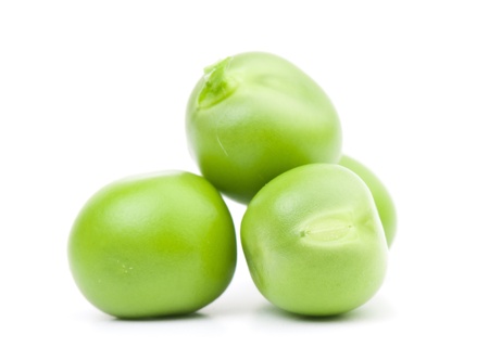 fresh green peas isolated on a white background. Studio photoの写真素材