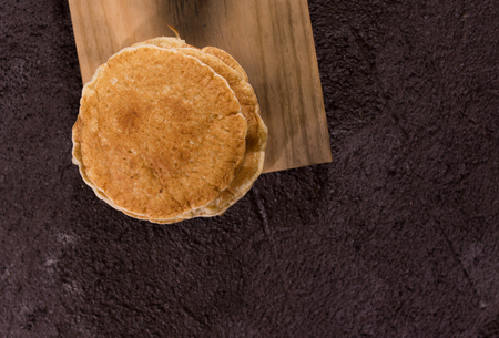 pancake breakfast on wooden boardの写真素材