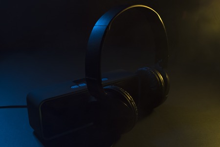 Music concept. Speaker and headphones isolatedの写真素材