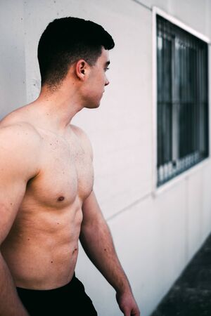 fitness boy resting after exercisingの写真素材