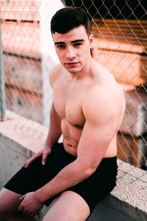 fitness boy resting after exercising