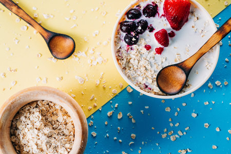 Breakfast. Bowl of oat milk with oat flakes and berries. Vegan food. Health day