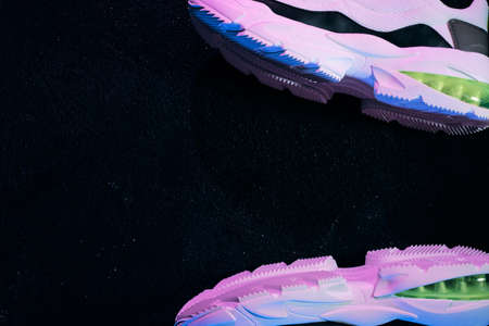 Sneakers for sports on asphalt background, with copyspaceの写真素材