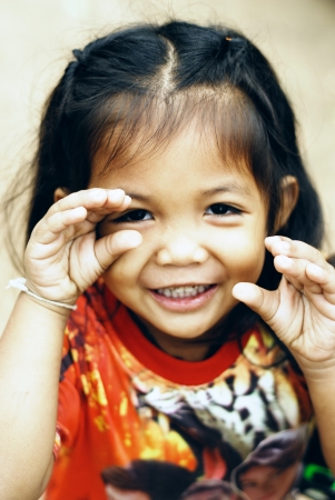 cute kid doing nice posing の写真素材