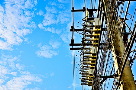 electricity post in blue skyの写真素材