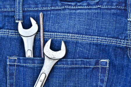 tools in new blue jeansの写真素材