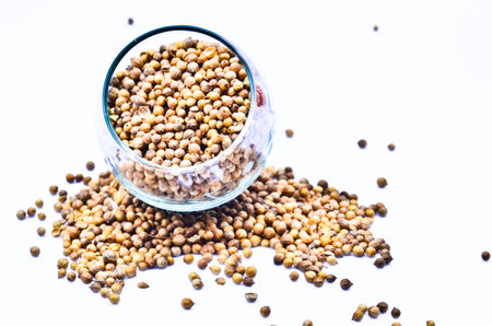 Coriander seeds in glass
