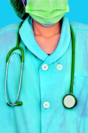 Doctor and stethoscope on light blue backgroundの写真素材