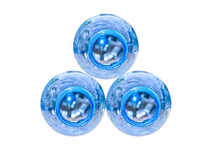 Stack top plastic bottles on white background