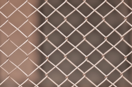 Old iron wire fenceの写真素材