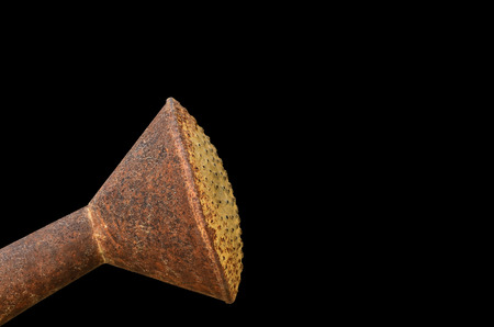 Rust Shower head watering on black backgroundの写真素材