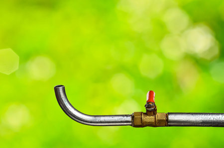 Faucets on nature background