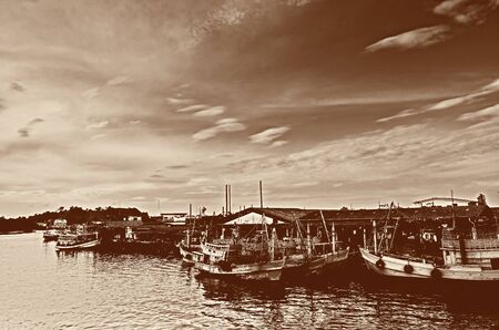 Old wooden fishing boats mooredの写真素材