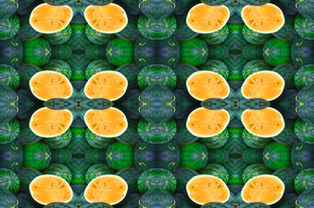 watermelons and a slice on themの写真素材