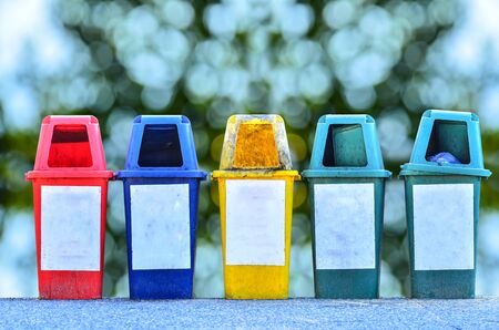 trashcan on the park in green nature backgroundの写真素材
