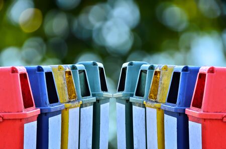 Group trashcan on the park on green nature backgroundの写真素材