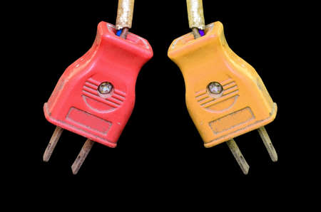 Two Old Plug isolate on black backgroundの写真素材