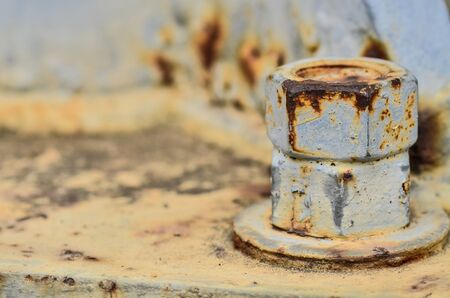 Big rusty metal nuts lockedの写真素材