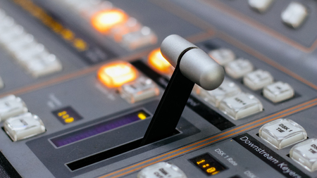 Close up of video mixer control panel at tv broadcasting studio. Selective focus.の写真素材