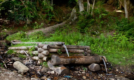 Small waterfall in forest in Carpathianの写真素材