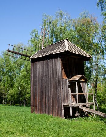 Old ukrainian mill in forestの写真素材