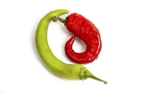 Chili peppers composition isolated on whiteの写真素材