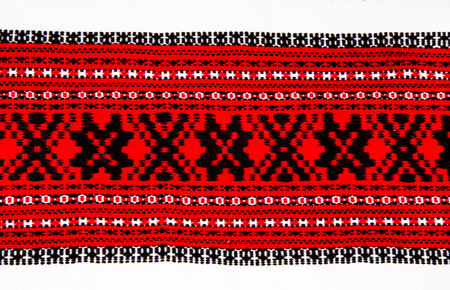 Ukrainian national red and black ornament embroidery closeupの写真素材
