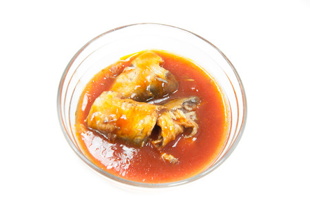 Canned fish in cup on white background,sardines in tomato sauce,isolatedの写真素材