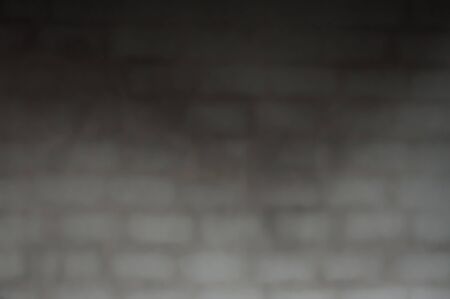 dark brick wall texture blur backgroundの写真素材