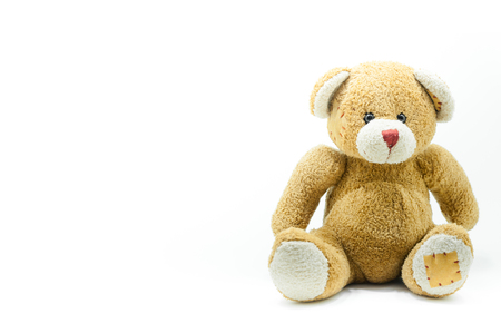 Brown Teddy Bear toy sitting on White backgroundの写真素材