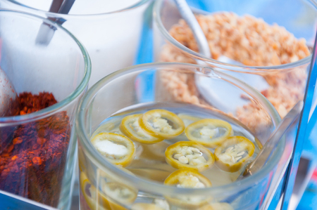 Thai flavouring for more tasty,sweet from sugar ,dry chilli,fish sauce  vinegar and Beansの写真素材