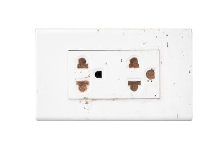 Old  electrical outlet isolated on white backgroundの写真素材