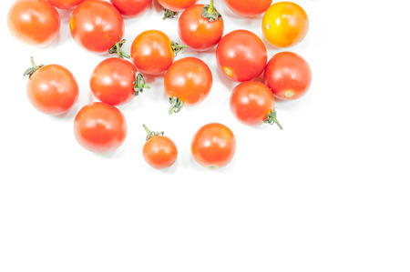 Group ripe cherry tomatoes on white backgroundの写真素材