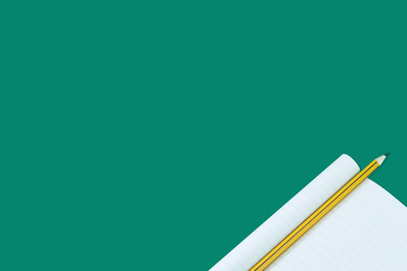 Notebook with pencil isolate on green background,for art education backgroundの写真素材